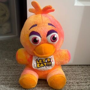 Orange and Yellow Stuffed Animal Toy